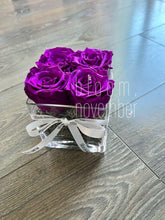 preserved flower purple rose in vase bloom november